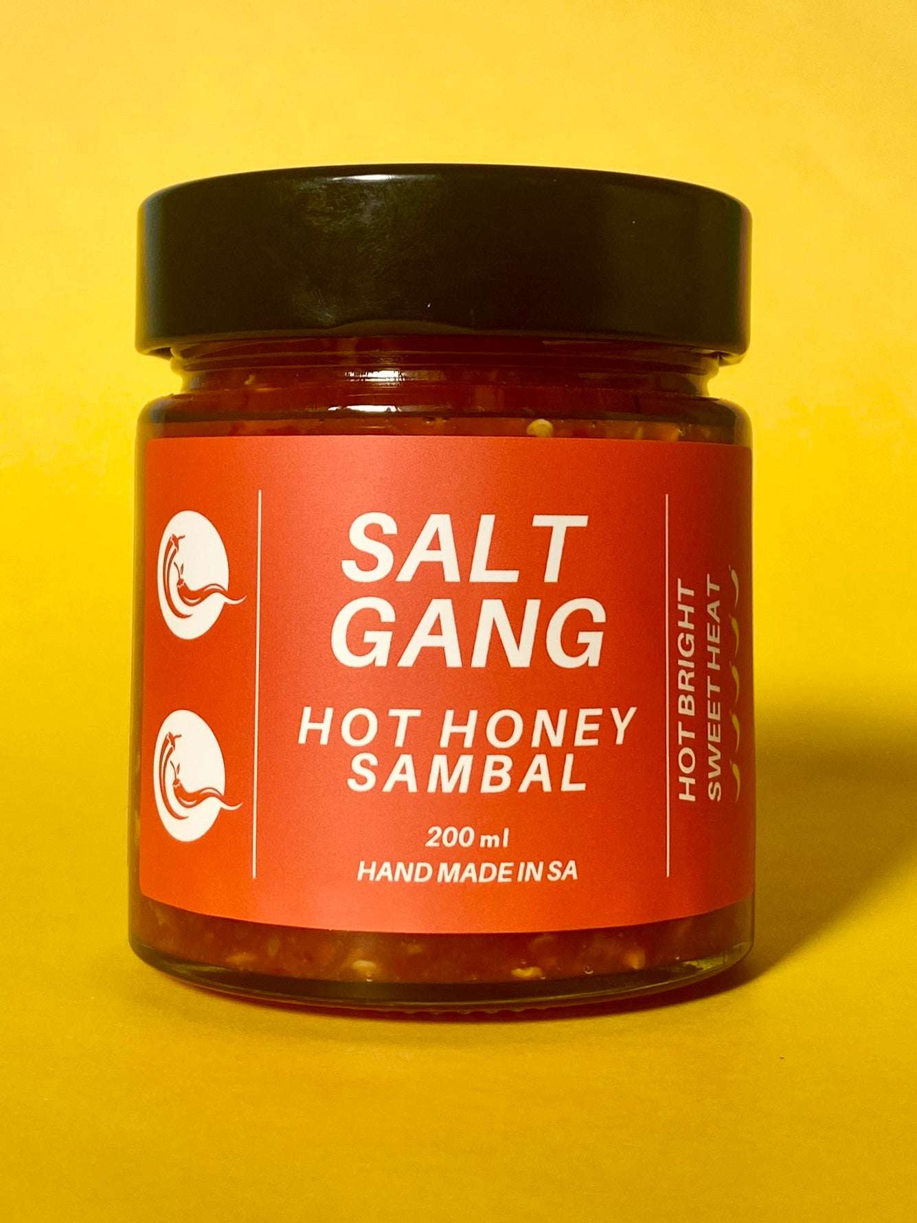 Salt Gang Hot Honey Sambal in a glass jar, gluten-free chili sauce.