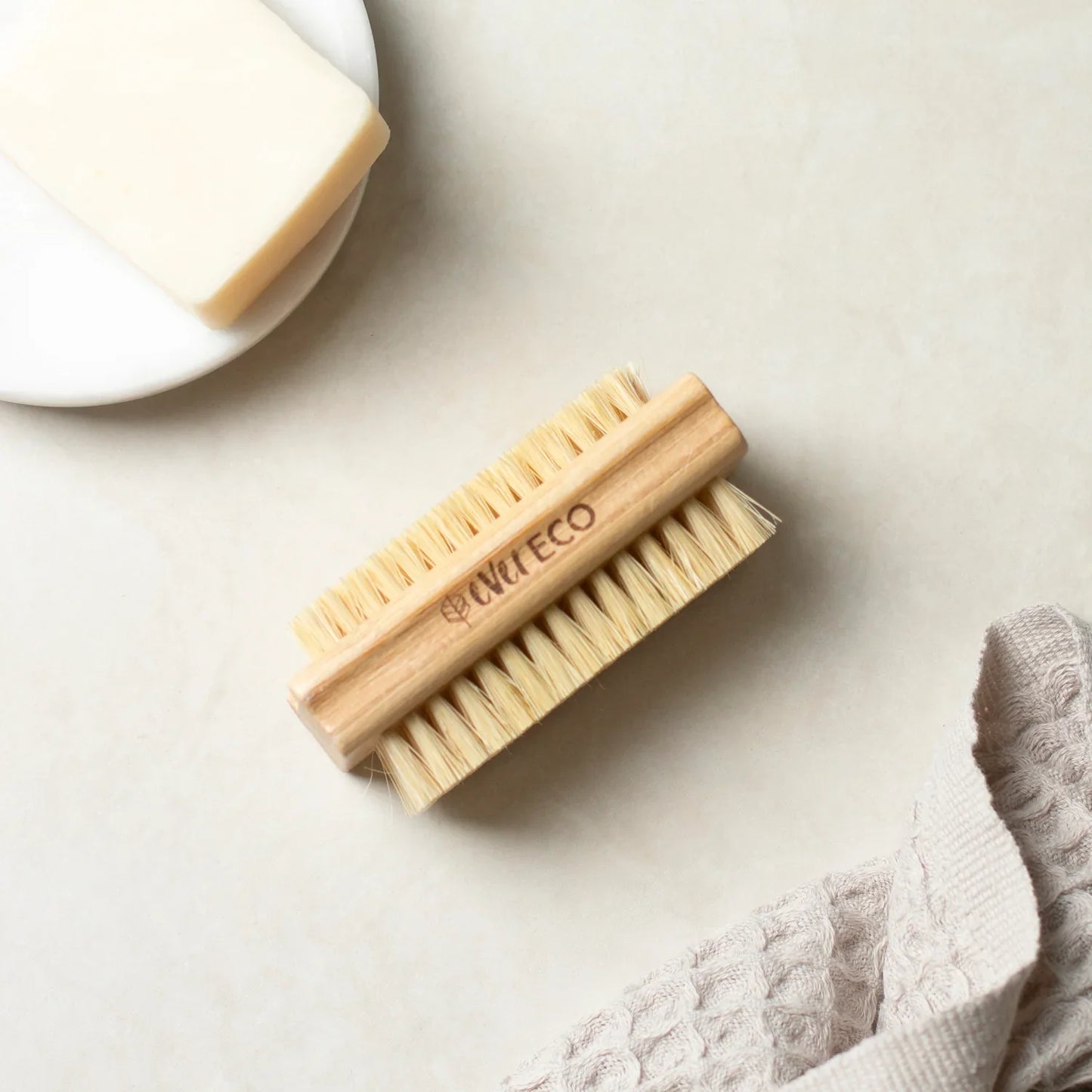 Eco-friendly bamboo nail brush with sisal bristles.