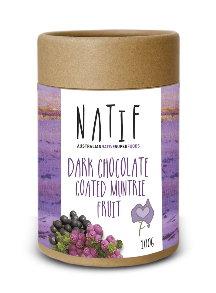 Natif dark chocolate coated Muntrie fruit in biodegradable tube packaging, best-selling vegan snack.