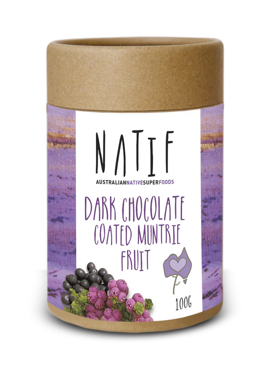 Natif dark chocolate coated Muntrie fruit in biodegradable tube packaging, best-selling vegan snack.