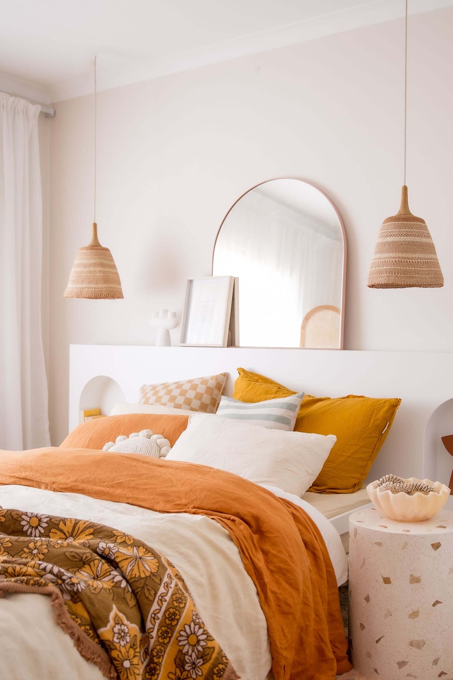 Bespoke woven pendant lights from Coastal Collection in a modern bedroom setting.