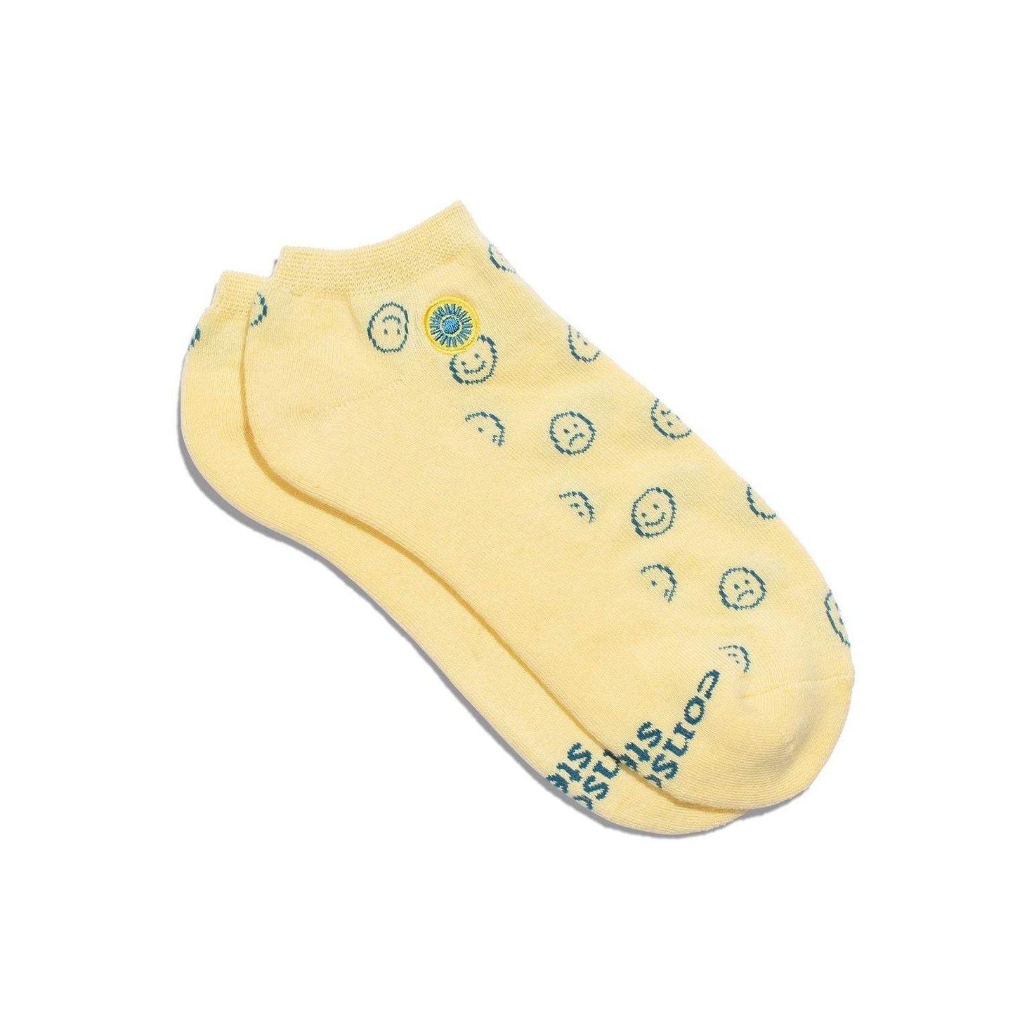 Conscious Step ankle socks with smiley faces supporting mental health.