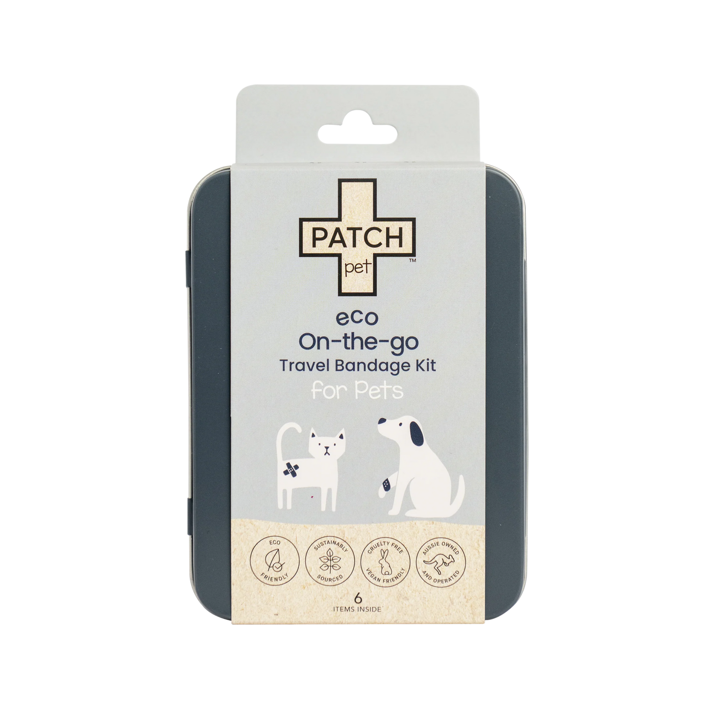 Eco-friendly travel bandage kit for pets, including wrap bandages and gauze pads in a refillable tin.