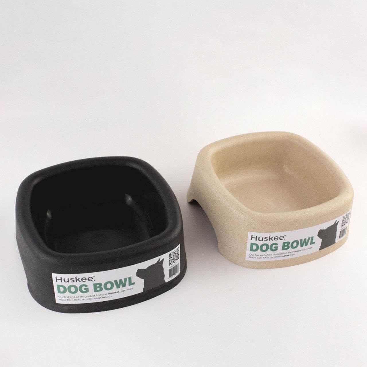 Eco-friendly Huskee dog bowls made from recycled HuskeeCups in black and beige.