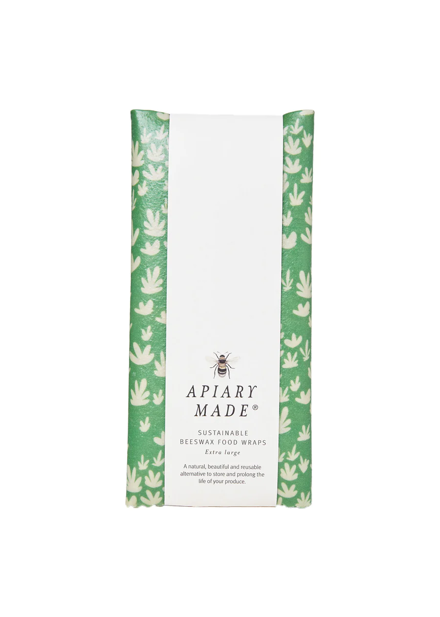 Apiary Made Extra Large Beeswax Wrap in green with white patterns for sustainable food storage.