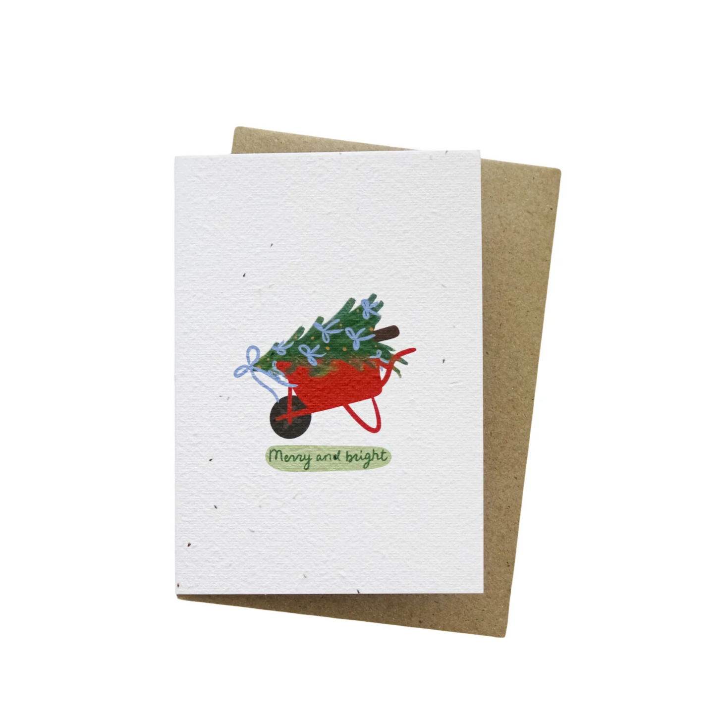 Hello Petal Merry and Bright Plantable Card with a red wheelbarrow carrying decorated greenery on recycled seeded paper and brown recycled envelope