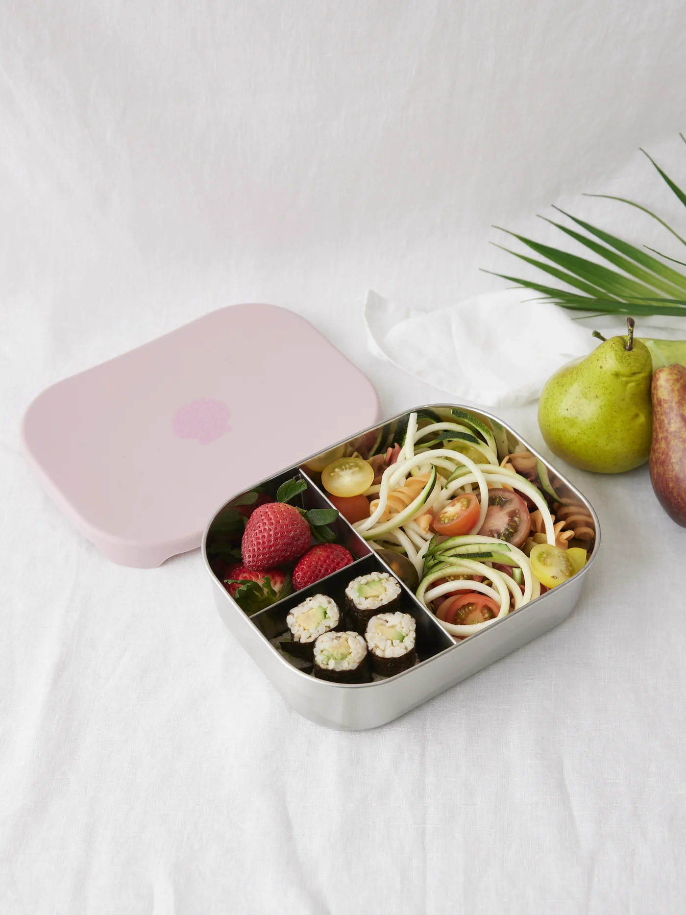 stainless steel bento lunch box with silicone lid from The Conscious Store, featuring food compartments
