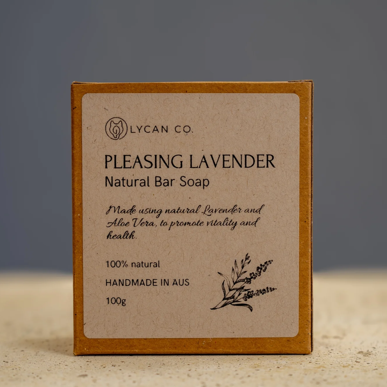 Lycan Co Pleasing Lavender Soap Bar in packaging with natural ingredients.