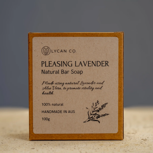 Lycan Co Pleasing Lavender Soap Bar in packaging with natural ingredients.