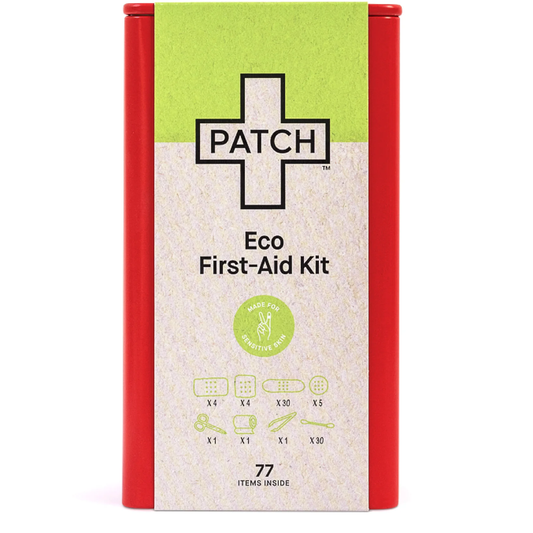 Eco-friendly first-aid kit in a red tin with 77 items including bamboo bandages, tweezers, and scissors. Ideal for camping or car use.