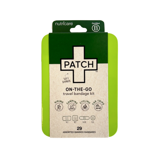 Black On-The-Go Travel Bandage Kit with bamboo bandages in a compact tin, ideal for camping and travel.