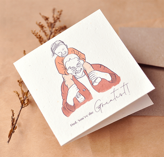 Nurturing Nature Cards plantable recycled card with illustration of child on dad's shoulders and text Dad You're the Greatest