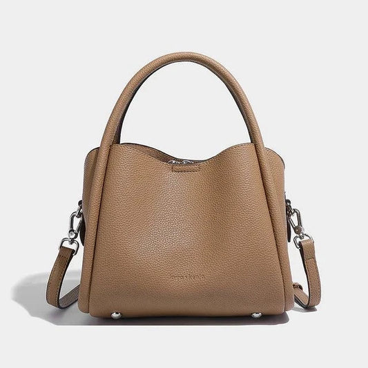 Kyra + Kenja Leah Crossbody bag Large with adjustable strap and triple compartment in vegan leather.