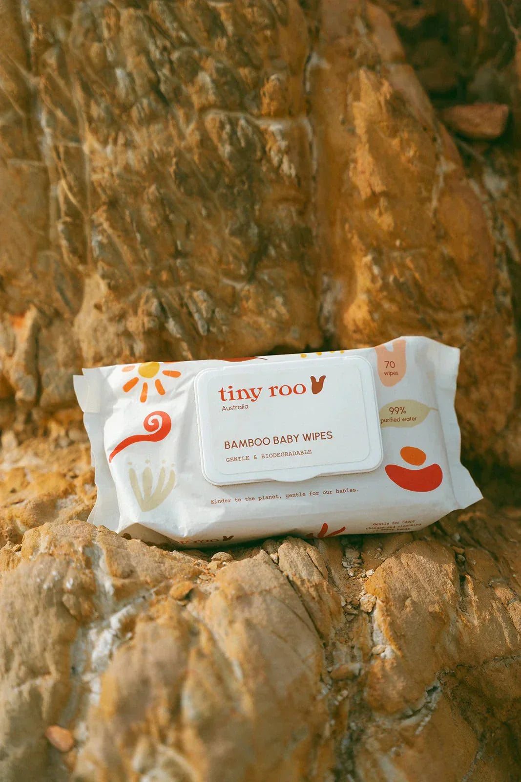 Tiny Roo Bamboo Baby Wipes on rocky surface.