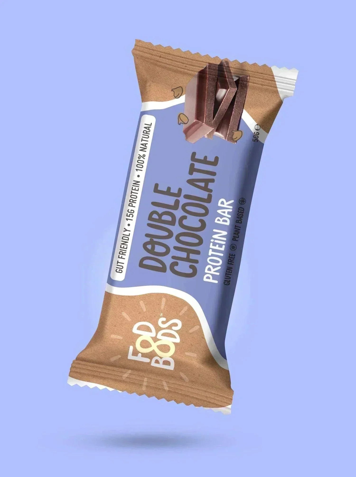 Fodbods Double Chocolate Protein Bar with almonds and dark chocolate chunks, plant-based and gluten-free, on light blue background.