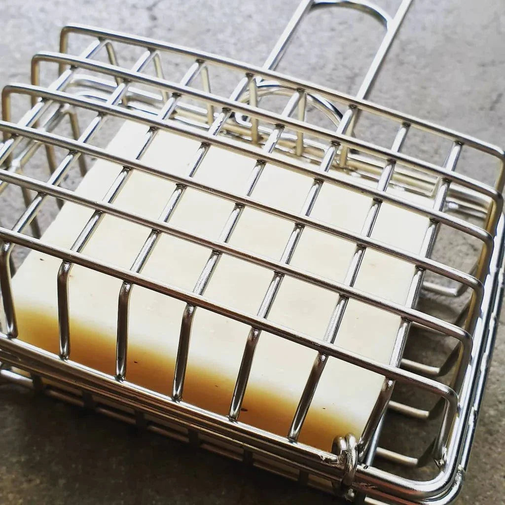 Red House Stainless Steel Soap Cage with soap inside for natural dishwashing.