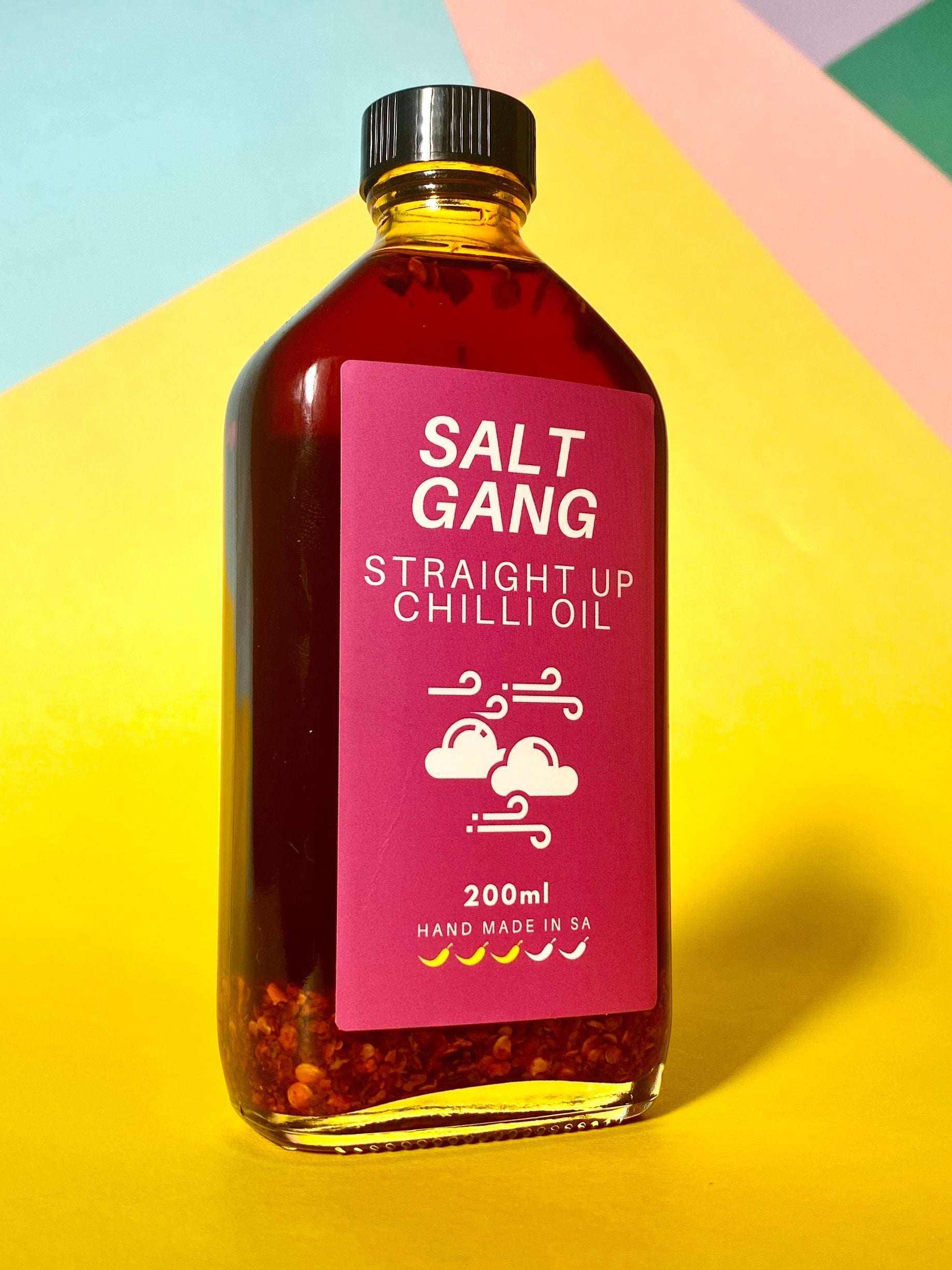 Salt Gang Straight up Chilli Oil in a 200ml glass jar, infused with spices, chili, and caramelised garlic, vegan and gluten-free.