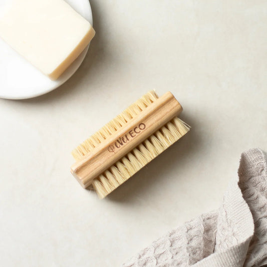 Eco-friendly bamboo nail brush with sisal bristles.