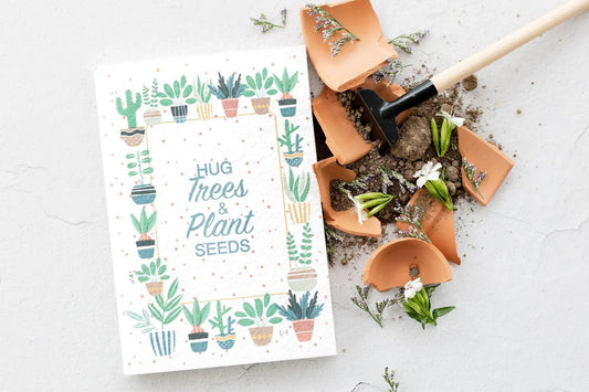 Eco-friendly BĪJ Notebook with plantable seed paper by Left-Handesign, features "Hug Trees & Plant Seeds" design.