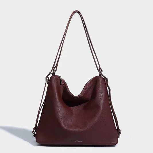 Kyra + Kenja Ava Convertible Backpack 3in1 in vegan leather, versatile 3-way design with silver hardware.