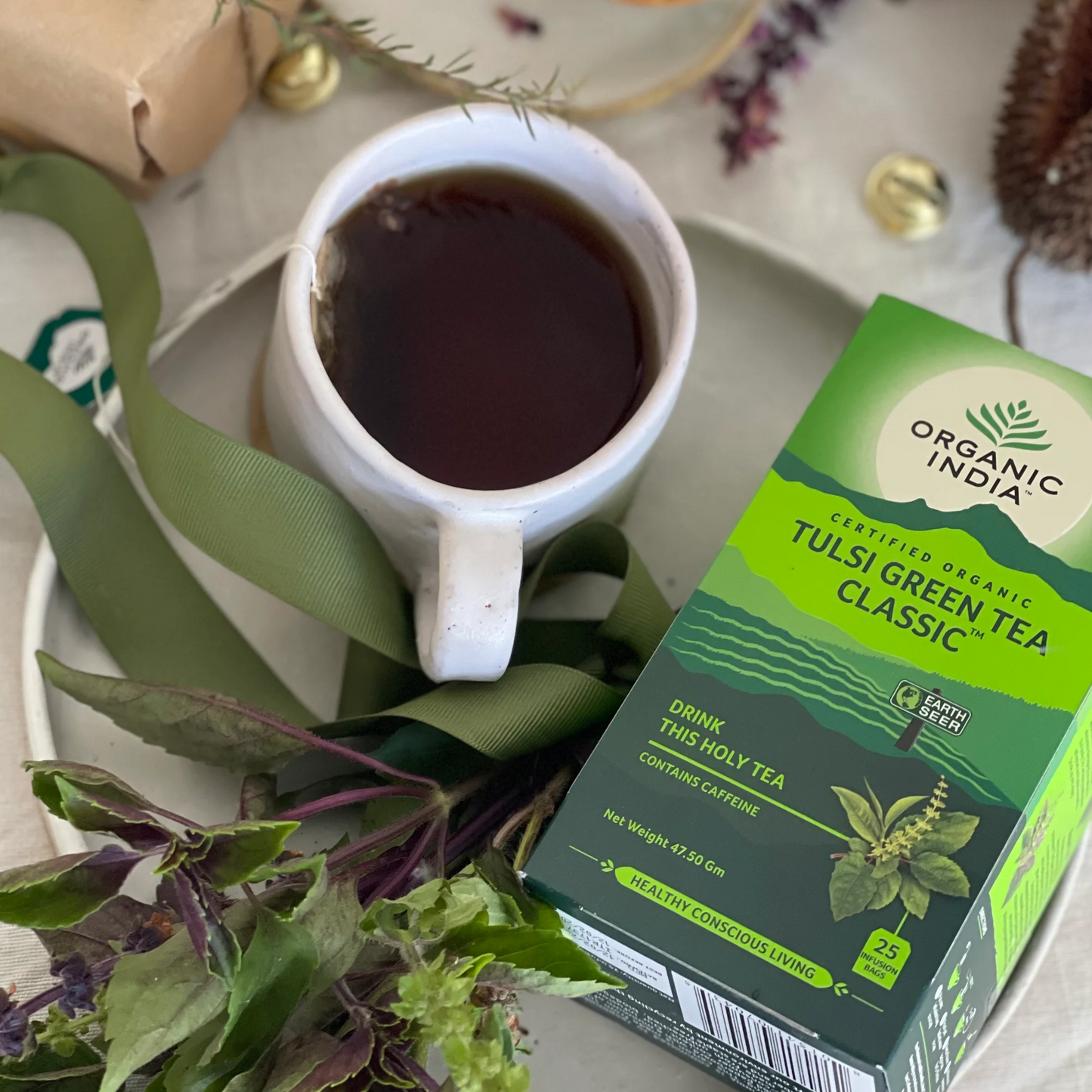 Organic India - Tulsi Green TeaA harmonious blend of Tulsi and green tea, Tulsi Green tea is simply accented with an aromatic lemon flavour lift from Tulsi. This wonderful flavour combination provOrganic India